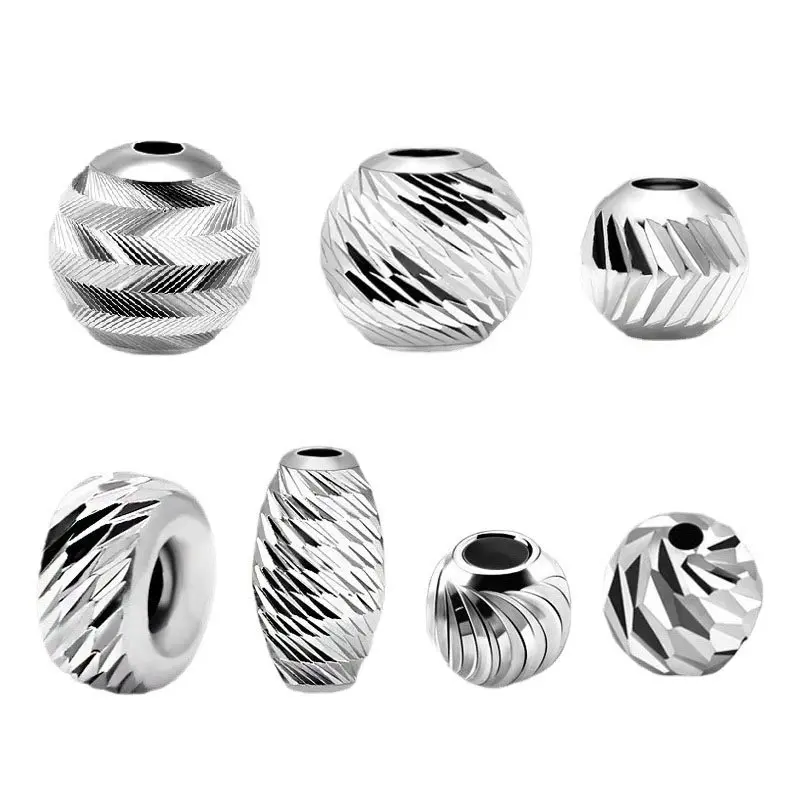 Shiny silver textured beads after cutting